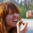 Small_girl_eating_asparagus