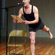 Small_man_speaking_into_mic