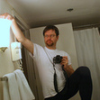 Small_man_with_camera
